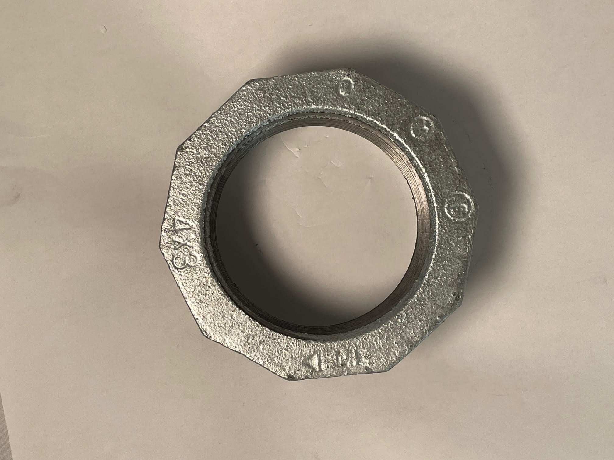 Galvanized Reducing Bushing, 4 Inch x 3 Inch NPT Thread