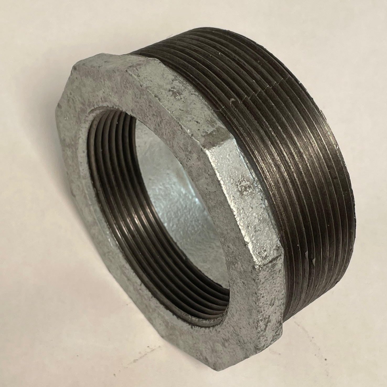 Galvanized Reducing Bushing, 4 Inch x 3 Inch NPT Thread
