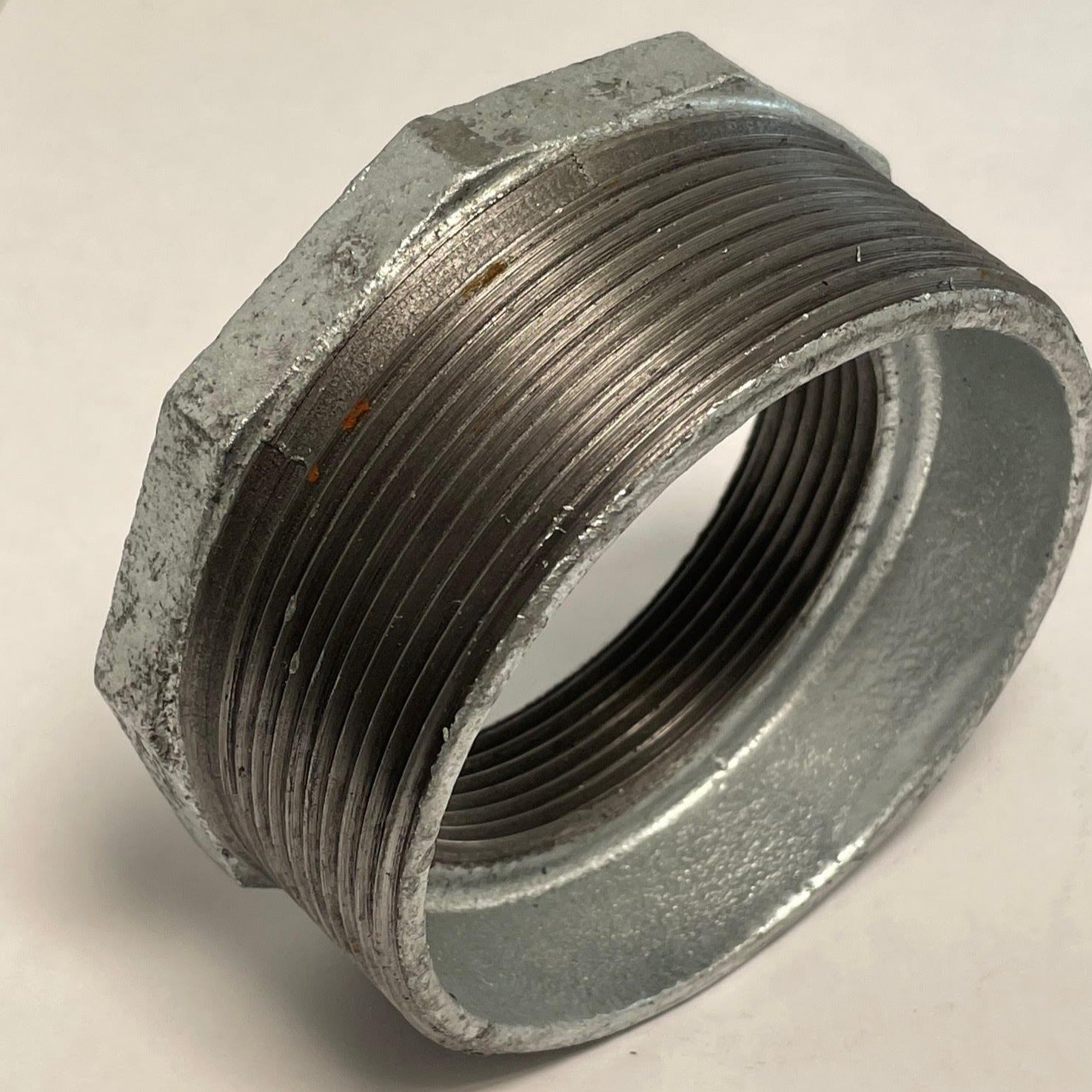 Galvanized Reducing Bushing, 4 Inch x 3 Inch NPT Thread
